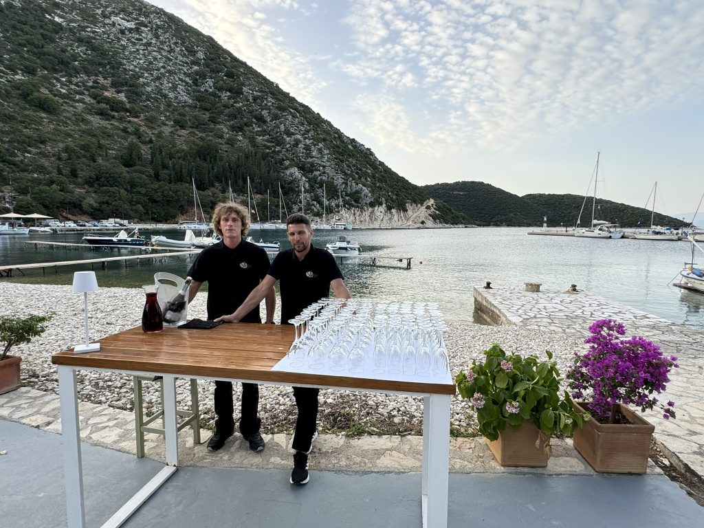Ayeri team preparing the open bar at wedding reception in Ithaca Greece Frikes