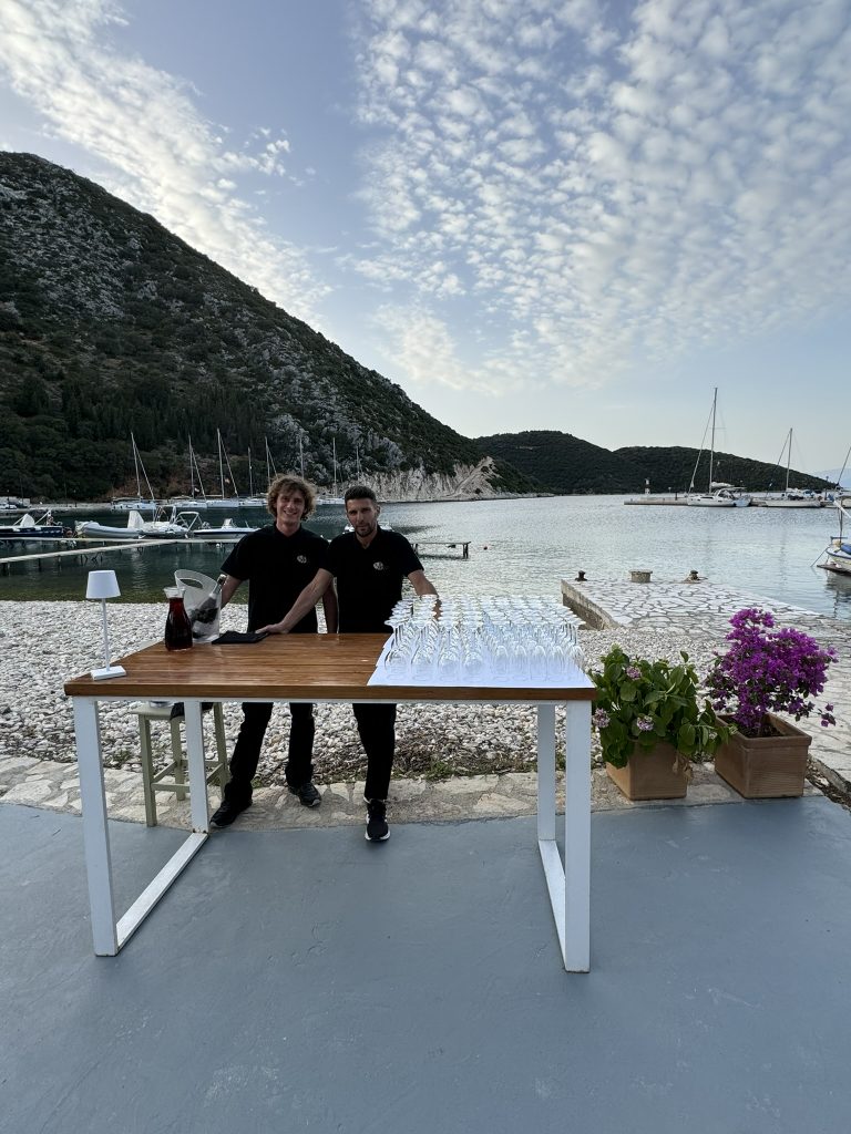 Ayeri team preparing the open bar at wedding reception in Ithaca Greece Frikes