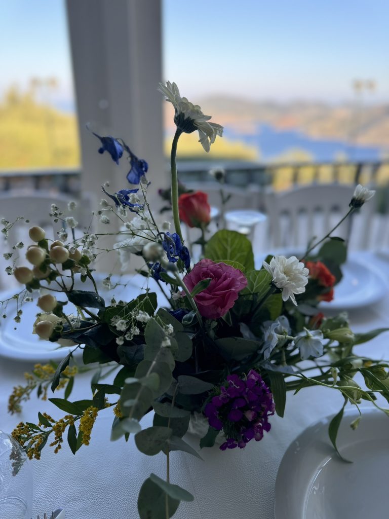 Flower detail at wedding rehearsal dinner in Ithaca Greece, Anoghi
