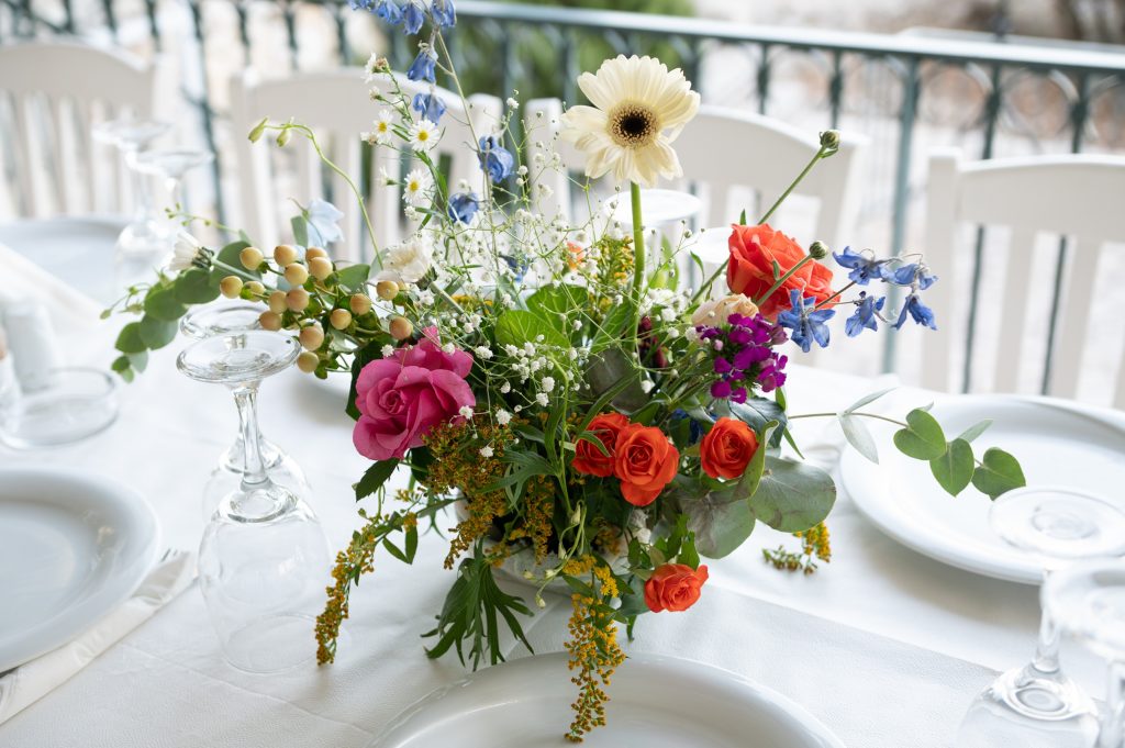 Flower detail at wedding rehearsal dinner in Ithaca Greece, Anoghi
