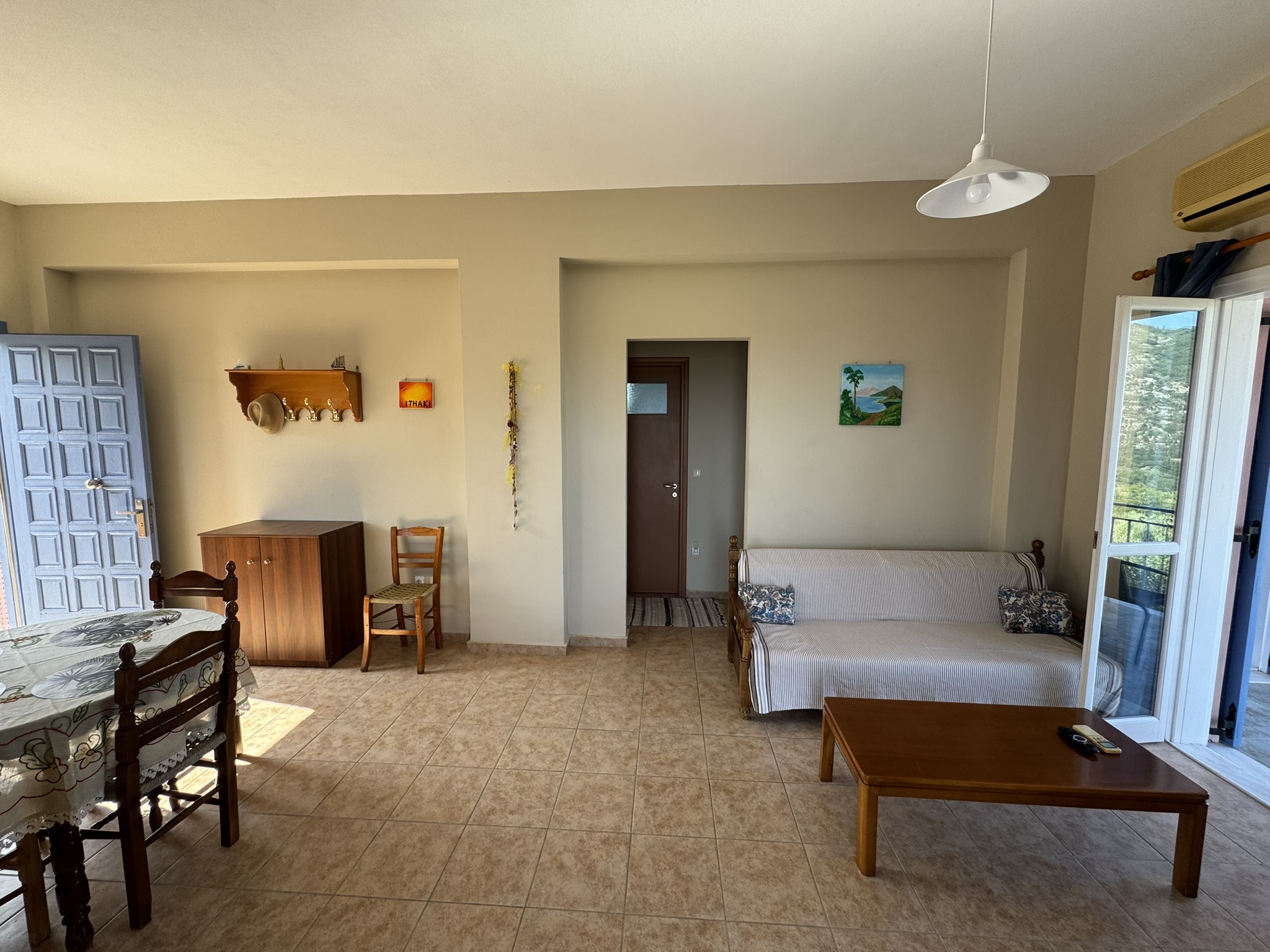 Dining and living area of house for rent in Ithaca Greece, Stavros
