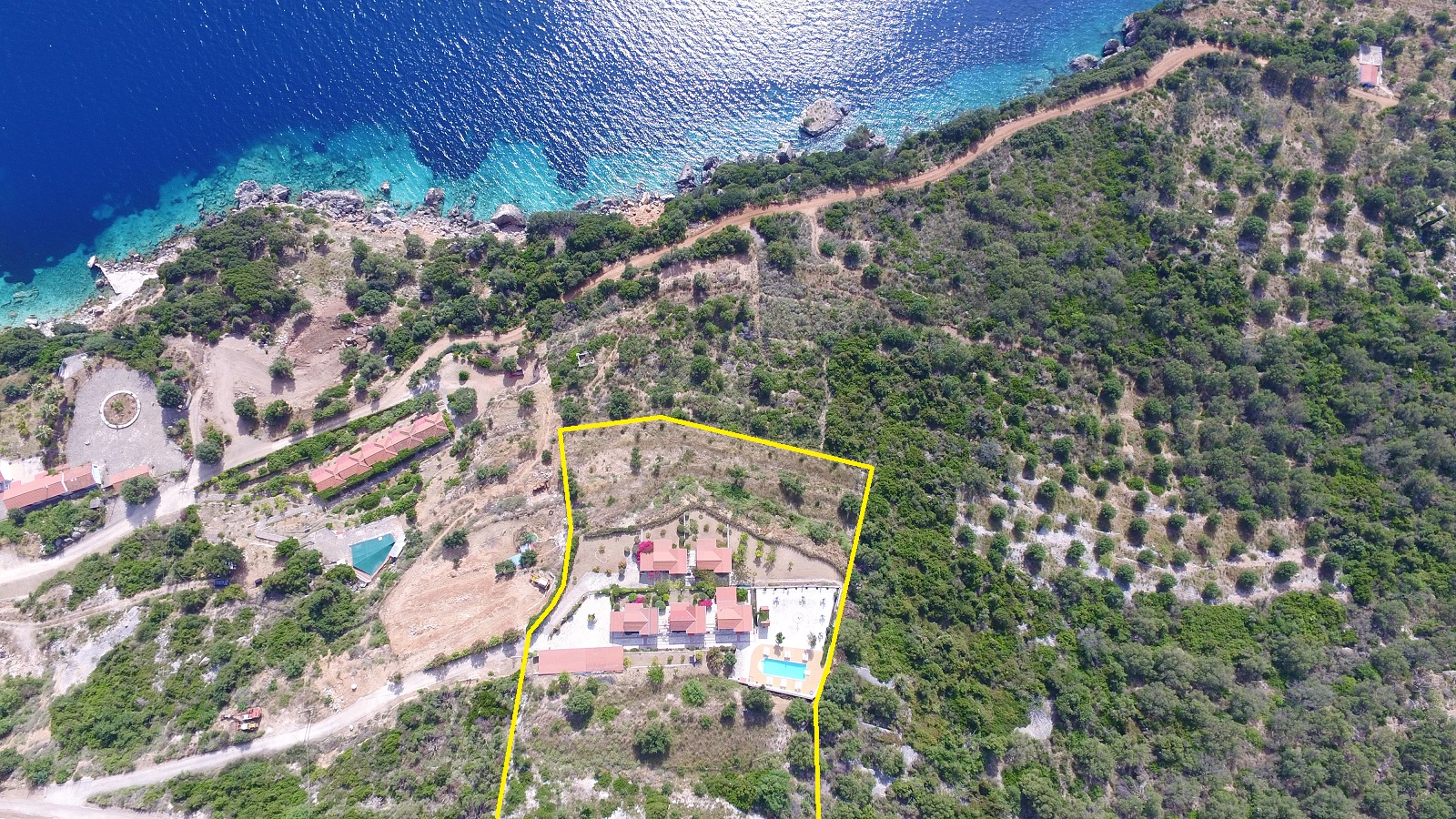 Aerial view with outlined border of cottages for sale in Ithaca Greece, Stavros